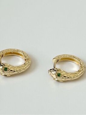 Gold Snake Huggie Earrings with Green Stone Eyes
